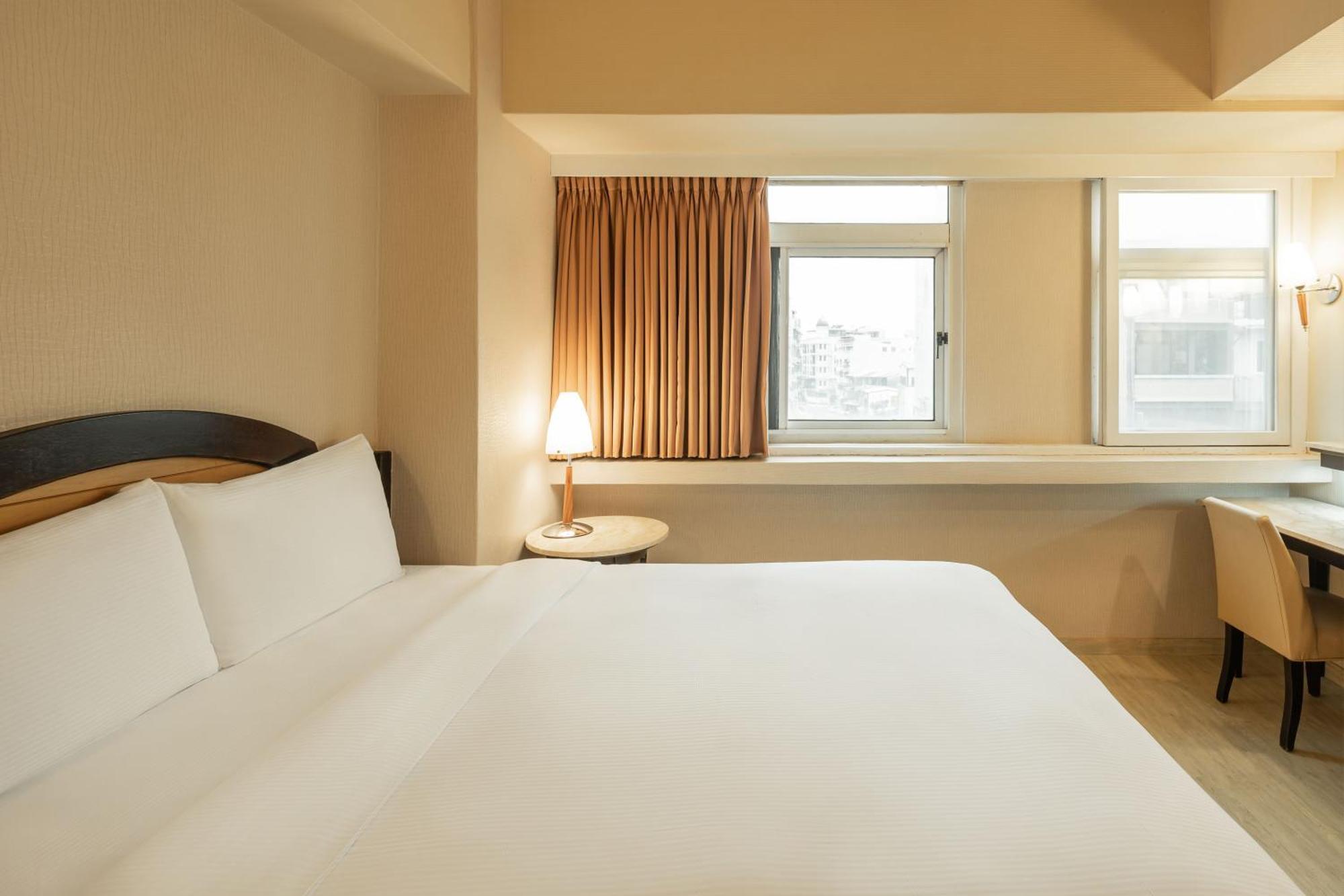 Kindness Hotel Weiwuying Kaohsiung Zimmer foto