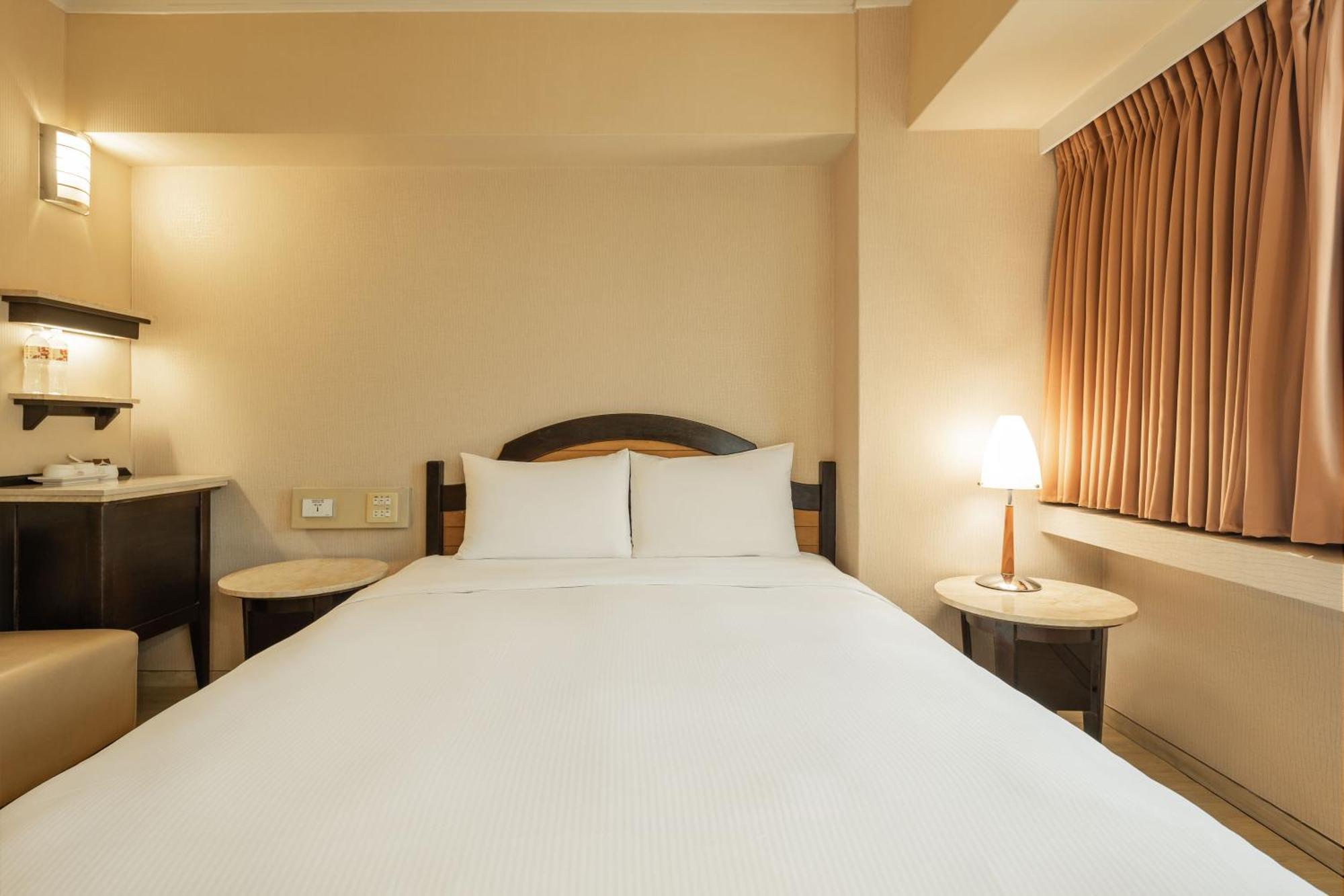 Kindness Hotel Weiwuying Kaohsiung Zimmer foto