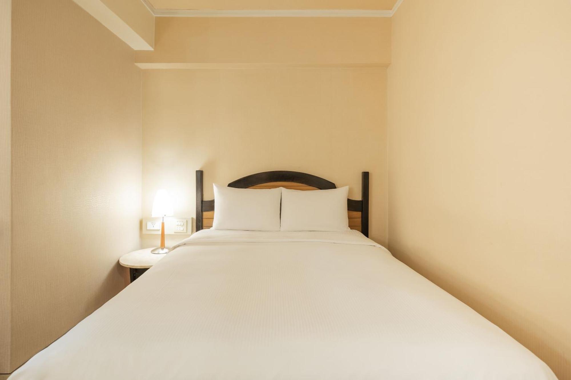 Kindness Hotel Weiwuying Kaohsiung Zimmer foto