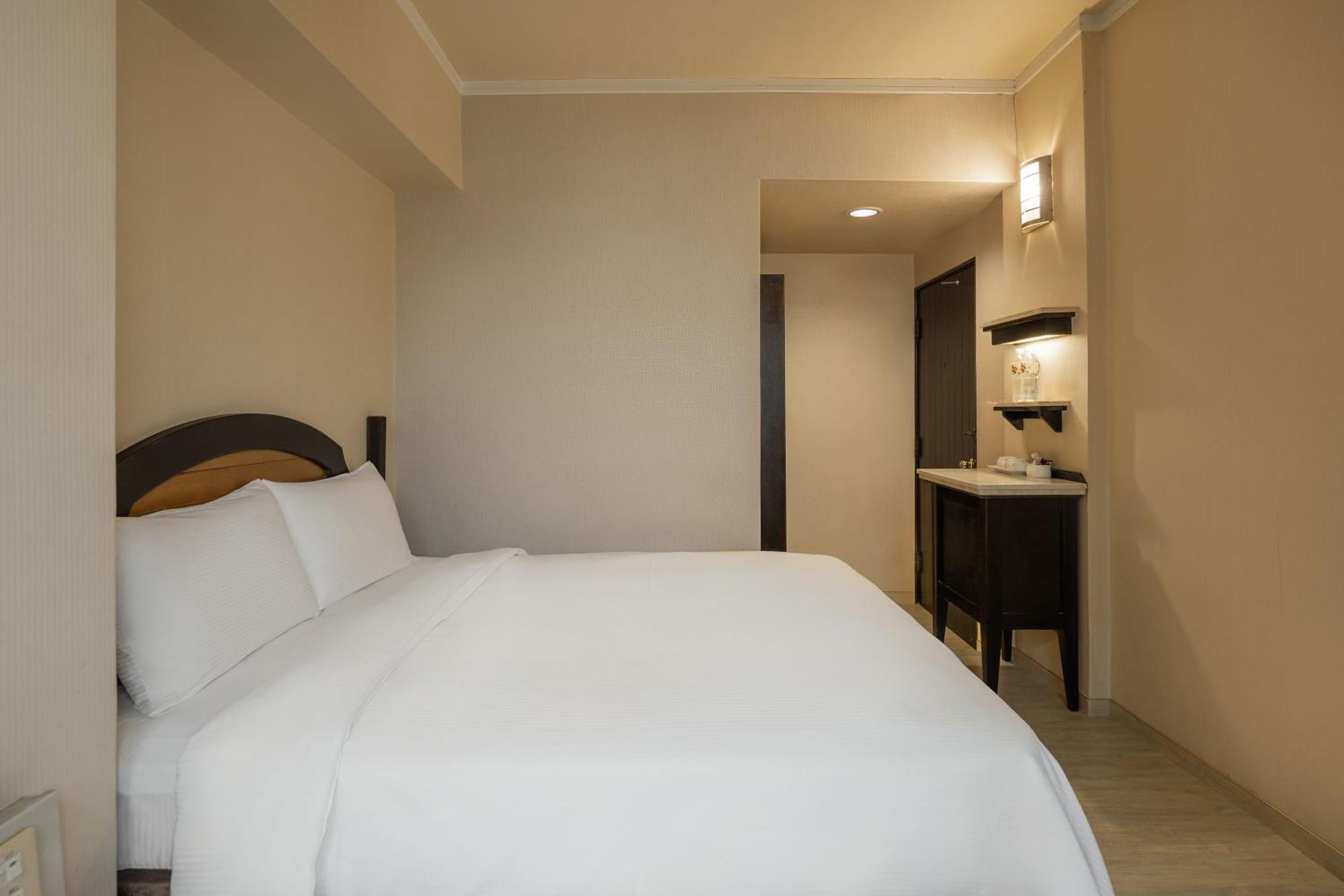 Kindness Hotel Weiwuying Kaohsiung Zimmer foto
