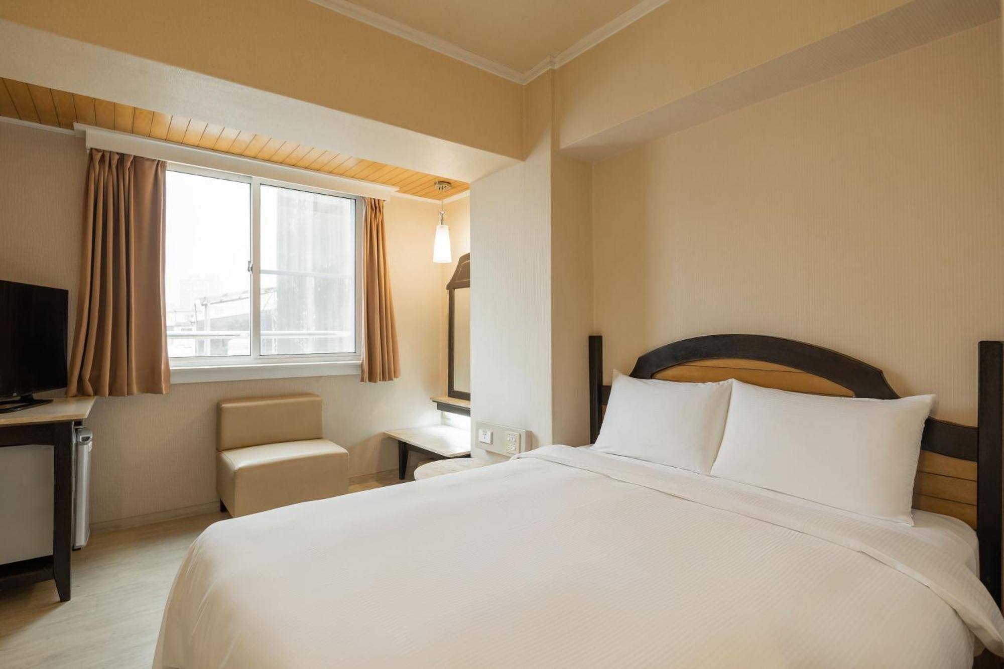 Kindness Hotel Weiwuying Kaohsiung Zimmer foto